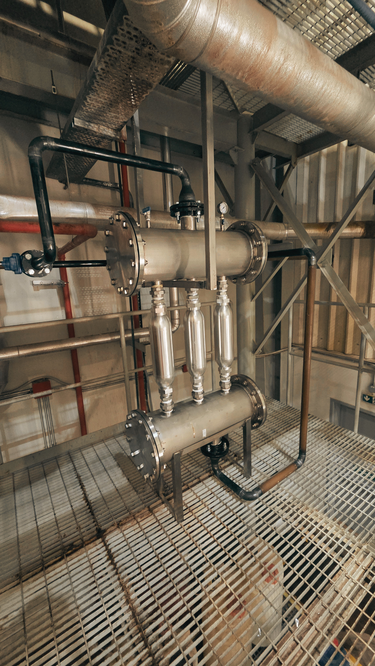 Three Super Energy units installed on the fuel line at a client facility
